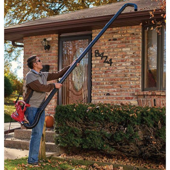 A man cleaning gutter in the house